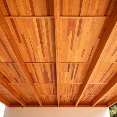 Sunset Porch Pavilion (Options: 20' x 12', Posts and Roof Timbers are Mosaic Douglas-Fir, Parquet Roofing is Mosaic Redwood, 8ft H, No Electrical Wiring Trim, 2-Post Anchor Kit for Concrete, No Post Decorative Trim, No Ceiling Fan Base, No Curtain Rods, Transparent Premium Sealant). Internal Ceiling is Our New Parquet Roofing Finish in California Redwood.