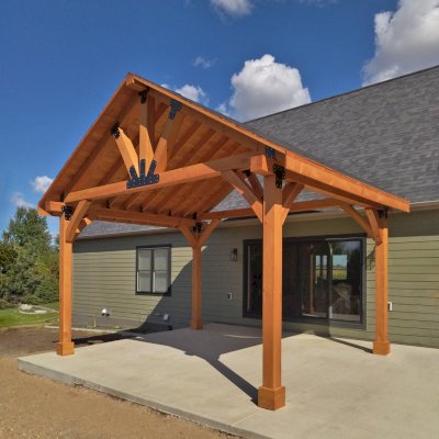 Thick Timber Toledo Wood Pavilion (Options: 16' L x 20' W, Douglas-fir, 4-Post Anchor Kit for High-Wind, No Curtain Rods, No Electrical Wiring Trim, 8 x 8 Supports, Rafters and Posts, Transparent Premium Sealant). Photo Courtesy of J. Jacques of Hutchinson, MN.