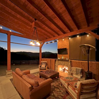 Custom Thick Timber Toledo Wood Pavilion (Options: 20' L x 33' W, Douglas-fir, with 2 Fascia Boards, Custom Roof Pitch, 10' H Posts, with 8 Posts by Custom Request, Coffee-Stain Premium Sealant). Photo Courtesy of P. Bierwith of San Ramon, CA.