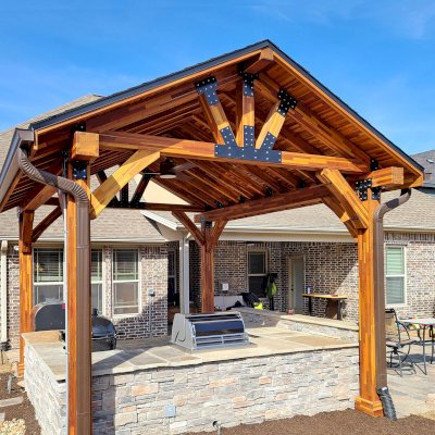 Thick Timber Toledo Wood Pavilions  (Options: 16' L x 14' W, Mosaic Redwood, 4-Post Anchor Kit for High-Wind, Electrical Wiring Trim for 1 Post, 8 x 8 Supports and Posts, 8 x 8 Rafters, 1 Fan Base, Transparent Premium Sealant). Photo Courtesy of A. Shaver of Rogers, Arkansas.