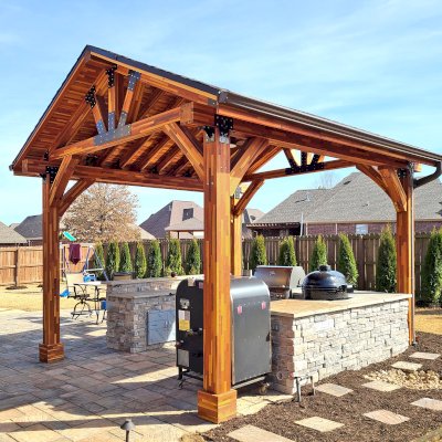 Thick Timber Toledo Wood Pavilions  (Options: 16' L x 14' W, Mosaic Redwood, 4-Post Anchor Kit for High-Wind, Electrical Wiring Trim for 1 Post, 8 x 8 Supports and Posts, 8 x 8 Rafters, 1 Fan Base, Transparent Premium Sealant). Photo Courtesy of A. Shaver of Rogers, Arkansas.