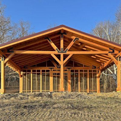 Thick Timber Toledo Wood Pavilions  (Options: 33' L x 33' W, Douglas-fir, 6-Post Anchor Kit for High-Wind, Electrical Wiring Trim for 2 Posts, 8 x 8 Supports and Rafters, 8 x 8 Posts, No Fan Base, with Screening Panels by Custom Request, Transparent Premium Sealant). Photo Courtesy of C. Segal of East Troy, WI.