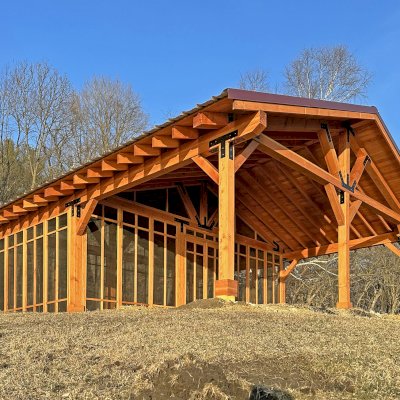 Thick Timber Toledo Wood Pavilions  (Options: 33' L x 33' W, Douglas-fir, 6-Post Anchor Kit for High-Wind, Electrical Wiring Trim for 2 Posts, 8 x 8 Supports and Rafters, 8 x 8 Posts, No Fan Base, with Screening Panels by Custom Request, Transparent Premium Sealant). Photo Courtesy of C. Segal of East Troy, WI.