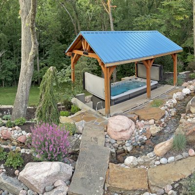 Thick Timber Toledo Wood Pavilion (Options: 24' L x 16' W, Douglas-fir, Post Anchor Kit for Concrete, 9' H Posts, No Electrical Wiring Trim, 8 x 8 Posts and Top Chord of Trusses, 8x8 Supports, 6x8 Bottom Chord and 6x6 Top Chord, 2x6 Rafters, 2 Fan Bases, Transparent Premium Sealant). Photo Courtesy of J. Lampen of Grain Valley, MO.