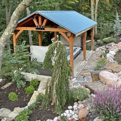 Thick Timber Toledo Wood Pavilion (Options: 24' L x 16' W, Douglas-fir, Post Anchor Kit for Concrete, 9' H Posts, No Electrical Wiring Trim, 8 x 8 Posts and Top Chord of Trusses, 8x8 Supports, 6x8 Bottom Chord and 6x6 Top Chord, 2x6 Rafters, 2 Fan Bases, Transparent Premium Sealant). Photo Courtesy of J. Lampen of Grain Valley, MO.