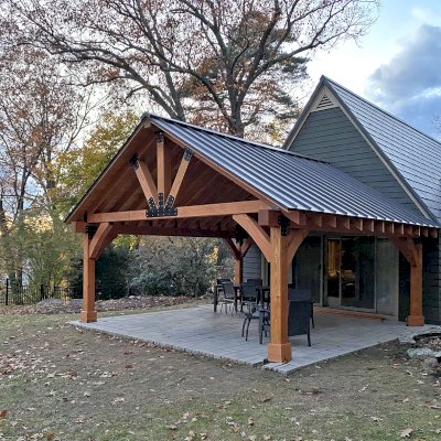Thick Timber Toledo Wood Pavilion  (Options: 20' L x 20' W, Douglas-fir, 4-Post Anchor Kit for High-Wind, Electrical Wiring Trim for 1 Post, 8 x 8 Supports and Posts, 8 x 8 Rafters, 1 Fan Base, Transparent Premium Sealant). Photo Courtesy of T. Scheu of Winchester, Massachusetts.