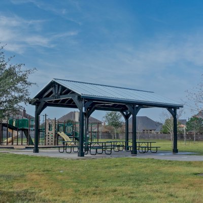 Thick Timber Toledo Wood Pavilion (Options: 30' L x 18' W, Douglas-fir, 6-Post Anchor Kit for High-Wind, No Curtain Rods, 1 Electrical Wiring Trim, 8 x 8 Supports, Rafters and Posts, Black Stain Premium Sealant). Photo Courtesy of T. Harris of Katy, TX.