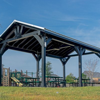 Thick Timber Toledo Wood Pavilion (Options: 30' L x 18' W, Douglas-fir, 6-Post Anchor Kit for High-Wind, No Curtain Rods, 1 Electrical Wiring Trim, 8 x 8 Supports, Rafters and Posts, Black Stain Premium Sealant). Photo Courtesy of T. Harris of Katy, TX.
