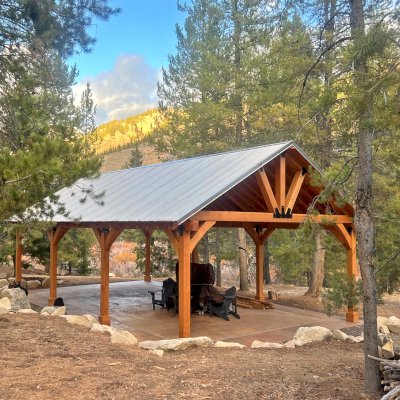 Thick Timber Toledo Wood Pavilion (Options: 40' L x 24' W, Douglas-fir, Post Anchor Kit for High-Wind, 9' H Posts, 2 Electrical Wiring Trims, 8 x 8 Posts, 8x10 Supports, 8x10 Bottom Chord and 8x8 Top Chord, 2x8 Rafters, 2 Fan Bases, Transparent Premium Sealant). Photo Courtesy of D. Stone of Fairfield, ID.