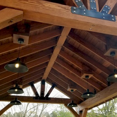 Thick Timber Toledo Wood Pavilions (Options: 20' L x 14' W, Douglas-fir, 4-Post Anchor Kit for High-Wind, No Electrical Wiring Trim Kit, 10 x 8 Supports, 8 x 8 Posts & Rafters, Coffee-Stain Premium Sealant). Photo Courtesy of Jerry McGinnis of Flowery Branch, Georgia.