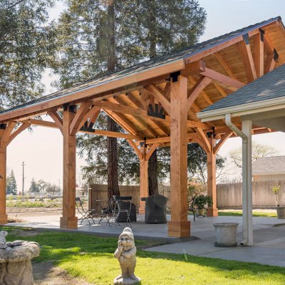 Thick Timber Toledo Wood Pavilions  (Options: 27' L x 25' W, Douglas-fir, 6-Post Anchor Kit for High-Wind, Electrical Wiring Trim for 2 Posts, 8 x 8 Supports and Rafters, 10 x 10 Posts, 2 Fan Bases, Transparent Premium Sealant). Photo Courtesy of T. Lane of Kingsburg, CA.