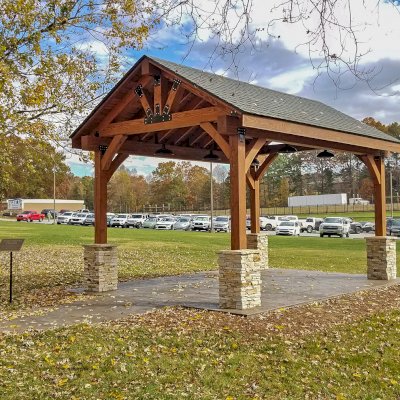 Thick Timber Toledo Wood Pavilions (Options: 20' L x 14' W, Douglas-fir, 4-Post Anchor Kit for High-Wind, No Electrical Wiring Trim Kit, 10 x 8 Supports, 8 x 8 Posts & Rafters, Coffee-Stain Premium Sealant). Photo Courtesy of Jerry McGinnis of Flowery Branch, Georgia.