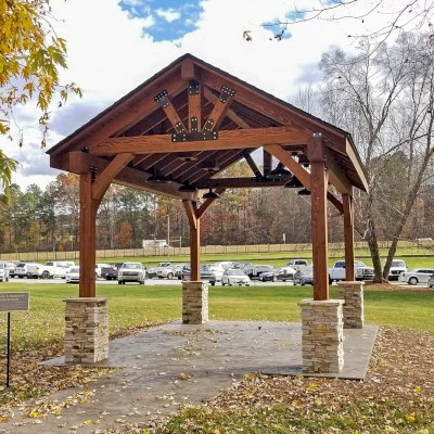 Thick Timber Toledo Wood Pavilions (Options: 20' L x 14' W, Douglas-fir, 4-Post Anchor Kit for High-Wind, No Electrical Wiring Trim Kit, 10 x 8 Supports, 8 x 8 Posts & Rafters, Coffee-Stain Premium Sealant). Photo Courtesy of Jerry McGinnis of Flowery Branch, Georgia.