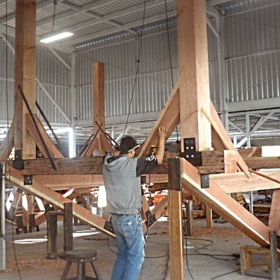 Thick Timber Toledo Wood Pavilion Construction image highlights massive timbers and steel plating used and shows Pavilion partially completed and prior to sanding or sealing. Yes, we build them upside down - much easier this way!