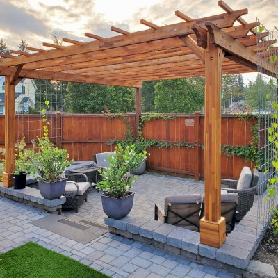 Traditional Wooden Garden Pergola (Options: 16' L x 16' W, Mosaic Redwood, Electrical Wiring Trim for 1 Post, Open Roof with Slats at 18", Rafters at 18", 2-Post Anchor Kit for Concrete, No Ceiling Fan Base, No Privacy Panels, No Curtain Rods, 9' Posts, Transparent Premium Sealant). 2 Back Posts Already Existing On Site. Photo Courtesy of J. Hawkes of Lacey, WA.
