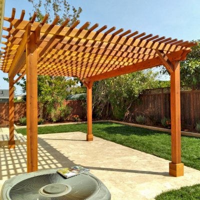 Traditional Wooden Garden Pergola (Options: 18' L x 12' W, California Redwood, No Electrical Wiring Trim, Open Roof with Slats at 6", Rafters at 18", 4-Post Anchor Kit for Concrete, No Ceiling Fan Base, No Privacy Panels, No Curtain Rods, 9' Posts, Transparent Premium Sealant). Photo Courtesy of A. Bhuta of Foster City, CA.