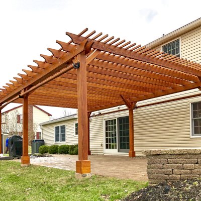 Traditional Wooden Garden Pergola (Options: 26' L x 18' W, Mature Redwood, 2 Electrical Wiring Trims, Open Roof with Slats at 6", Rafters at 18", 6-Post Anchor Kit for Concrete, No Ceiling Fan Base, No Privacy Panels, No Post Decorative Trims, 2 Curtain Rod, 9' Post Height, Transparent Premium Sealant). Photo Courtesy of H. Wittreich of Somerset, New Jersey.