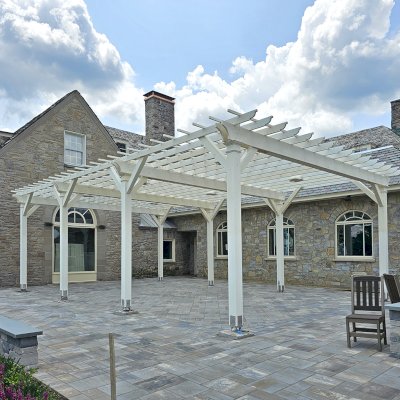 Traditional Wooden Garden Pergola (Options: 25' L x 40' W, Douglas-fir, Open Roof with Slats at 18", Horizontal Decorative Trims on All Posts, Rafters at 18", Post Anchor Kit for High-Wind, 6 Ceiling Fan Bases, No Privacy Panels, Electrical Wiring Trim Kit for All Posts, 12' Posts, White Wash Finish). Photo Courtesy of Onondaga Golf and Country Club of Kirkville, NY.