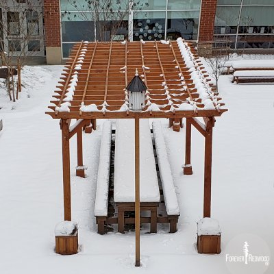 Traditional Wooden Garden Pergola (Options: 30' L x 12' W, Douglas-fir, Open Roof with Slats at 18, Transparent Premium Sealant). Shade clothe is a wonderful way to increase shade when needed. Shade Clothe shown is a custom detail we can add for you. Photo Courtesy of Frederick Douglass Elementary School of Lessburg, Virginia.