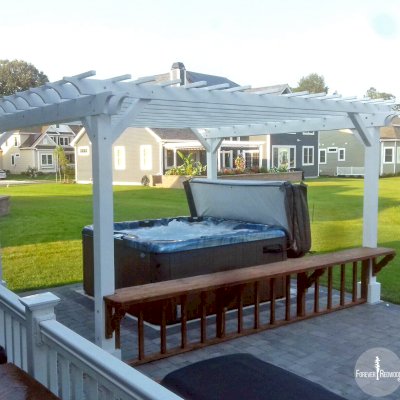 Traditional Wooden Garden Pergola (Options: 16' L x 14' W, Douglas-fir, No Electrical Wiring Trim, Open Roof with Slats at 12", Rafters at 18", 4-Post Anchor Kit for Concrete, No Ceiling Fan Base, No Privacy Panels, No Curtain Rods, 9' Post Height, Off-White Oil-Based Primer). Photo Courtesy of V. Yzaguirre of Lewes, Delaware.