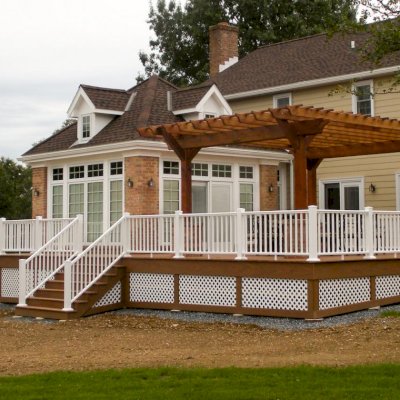 Traditional Wooden Garden Pergola (Options: 20' L x 15' W, Mature Redwood, No Electrical Wiring Trim, Slats at 12" and Rafters at 18", Widthwise Roof Support Timbers, 4-Post Anchor Kit for Wood, No Ceiling Fan Base, No Privacy Panels, No Curtain Rods, 9' Post Height, Transparent Premium Sealant). Photo Courtesy of Mr. Jeffrey S. of Lebanon, PA.