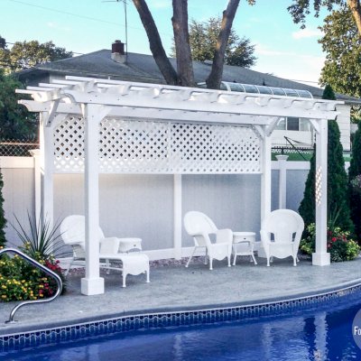 Traditional Wooden Garden Pergola (Options: 16' L x 8' W, Douglas-fir, No Electrical Wiring Trim, Open Roof with Slats at 12", Rafters at 18", Lengthwise Roof Support Timbers, 4-Post Anchor Kit for Stone, No Ceiling Fan Base, 1 Privacy Panel, No Curtain Rods, 9' Post Height, Off-White Oil-Based Primer). Photo Courtesy of Leo and Genevieve Kirchner of South Amboy, New Jersey.