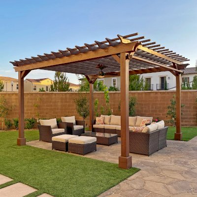 Traditional Wooden Garden Pergola (Options: 16' L x 15' W, Douglas-fir, 1 Electrical Wiring Trim, Open Roof with Slats at 12", Rafters at 12", 4-Post Anchor Kit for Concrete, 1 Ceiling Fan Base, No Privacy Panels, 1 Curtain Rod, 9.5' Posts, Custom Paint). Photo Courtesy of M. Ibrahim of Irvine, California.