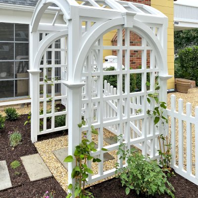 Custom Versailles Arbor (Options: 60" W x 60" D, Douglas-fir, 8' H, Custom Stain) with Custom Fence and Door. Photo Courtesy of Jessica and Brian Steel of Leesburg, Maryland.