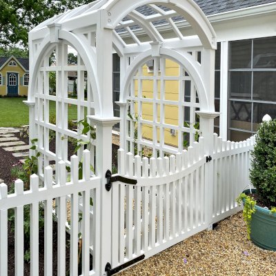 Custom Versailles Arbor (Options: 60" W x 60" D, Douglas-fir, 8' H, Custom Stain) with Custom Fence and Door. Photo Courtesy of Jessica and Brian Steel of Leesburg, Maryland.