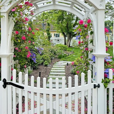 Custom Versailles Arbor (Options: 60" W x 60" D, Douglas-fir, 8' H, Custom Stain) with Custom Fence and Door. Photo Courtesy of Jessica and Brian Steel of Leesburg, Maryland.
