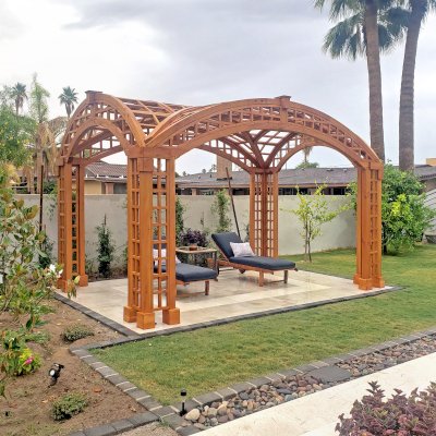 Victorian Arch Trellis Pergola (Options: 16' L x 10' W, Douglas-fir, Post Anchor Kit for Concrete, No Rain Guard, Transparent Premium Sealant). Photo Courtesy of B. Rowlison of Martinez Lake, AZ.