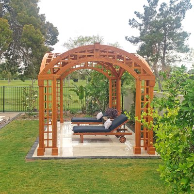 Victorian Arch Trellis Pergola (Options: 16' L x 10' W, Douglas-fir, Post Anchor Kit for Concrete, No Rain Guard, Transparent Premium Sealant). Photo Courtesy of B. Rowlison of Martinez Lake, AZ.