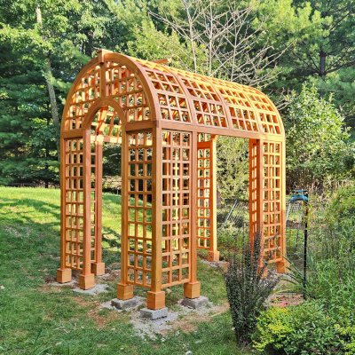 The Victorian Trellis (Options: 10' L x 8' W, Without Arcs and Lattice Panels, Douglas-fir, No Rain Guard, No Electrical Wiring Trim, Post Anchor Kit for High-Wind, 4x4 Posts, No Ceiling Fan Base, Transparent Premium Sealant). Photo Courtesy of C. Freeman of Saylorsburg, PA.