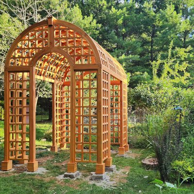 The Victorian Trellis (Options: 10' L x 8' W, Without Arcs and Lattice Panels, Douglas-fir, No Rain Guard, No Electrical Wiring Trim, Post Anchor Kit for High-Wind, 4x4 Posts, No Ceiling Fan Base, Transparent Premium Sealant). Photo Courtesy of C. Freeman of Saylorsburg, PA.