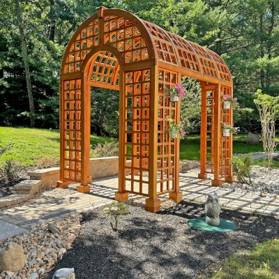 The Victorian Trellis (Options: 10' L x 8' W, Without Arcs and Lattice Panels, Douglas-fir, No Rain Guard, No Electrical Wiring Trim, Post Anchor Kit for High-Wind, 4x4 Posts, No Ceiling Fan Base, Transparent Premium Sealant). Photo Courtesy of C. Freeman of Saylorsburg, PA.