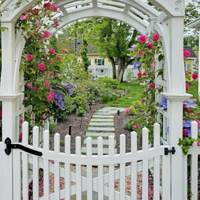 Custom Victorian Trellis (Options: 5' W x 5' D, Douglas-fir, 8' H, 4x4's Posts, Post Anchor Kit for Concrete, Custom Stain) with Custom Fence and Door. Photo Taken 2 Years After Installation. Photo Courtesy of Jessica and Brian Steel of Leesburg, Maryland.
