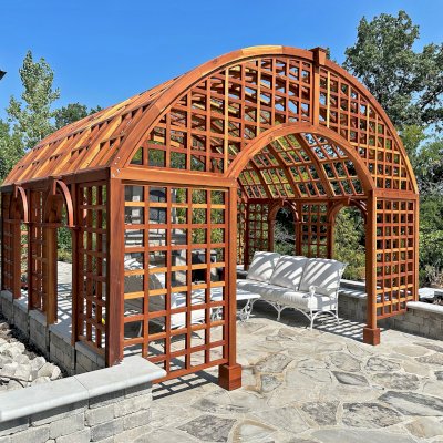 The Victorian Trellis (Options: 13' L x 16'-6" W, Combination of Arcs and Lattice Panels, California Redwood, No Rain Guard, 8' Post Height, No Electrical Wiring Trim, No Ceiling Fan Base, Transparent Premium Sealant). Photo Courtesy of J. Christesen of Kansas City, Missouri.