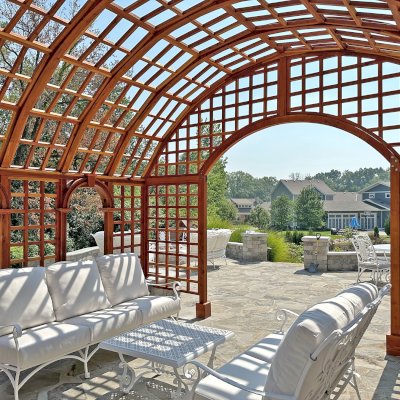 The Victorian Trellis (Options: 13' L x 16'-6" W, Combination of Arcs and Lattice Panels, California Redwood, No Rain Guard, 8' Post Height, No Electrical Wiring Trim, No Ceiling Fan Base, Transparent Premium Sealant). Photo Courtesy of J. Christesen of Kansas City, Missouri.