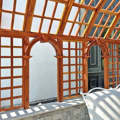 The Victorian Trellis (Options: 13' L x 16'-6" W, Combination of Arcs and Lattice Panels, California Redwood, No Rain Guard, 8' Post Height, No Electrical Wiring Trim, No Ceiling Fan Base, Transparent Premium Sealant). Photo Courtesy of J. Christesen of Kansas City, Missouri.
