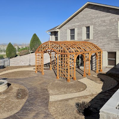 The Victorian Trellis (Options: 16' L x 16' W, Combination of Arcs and Lattice Panels, Douglas-Fir, No Rain Guard, 7' Post Height, 3 Electrical Wiring Trims, Ceiling Fan Base with Rain Guard, Transparent Premium Sealant). Photo Courtesy of R. Lamb of Commerce City.