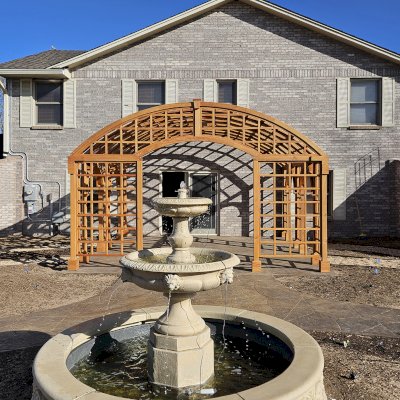 The Victorian Trellis (Options: 16' L x 16' W, Combination of Arcs and Lattice Panels, Douglas-Fir, No Rain Guard, 7' Post Height, 3 Electrical Wiring Trims, Ceiling Fan Base with Rain Guard, Transparent Premium Sealant). Photo Courtesy of R. Lamb of Commerce City.