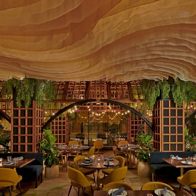 Custom Victorian Trellis (Options: California Redwood, Transparent Premium Sealant). Installed at restaurant ALLAVITA in 564 W Randolph St, Chicago, IL. Design By Kehoe Designs, Photographer: Anthony Tahlier.