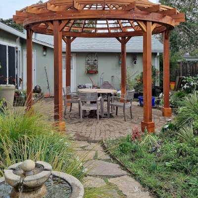 Wooden Dome Pergola (Options: 16' Diameter, Without Deck, California Redwood, Open Roof with Slats at 6", 9' Posts, No Electrical Wiring Trim, 6-Post Anchor Kit for Concrete, Transparent Premium Sealant).