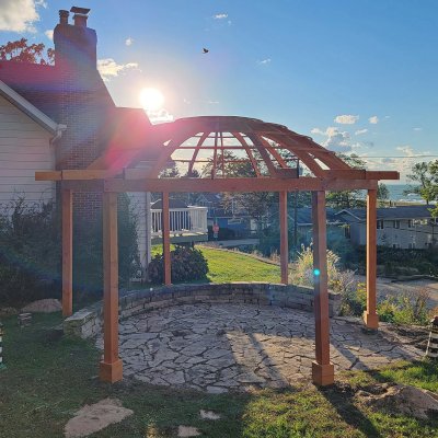 Custom Wooden Dome Pergola (Options: 21'-5" Diameter, Douglas-fir, 6-Post Anchor Kit for High-Wind, Transparent Premium Sealant). Photo Courtesy of A. Schaible of Michigan City, IN.