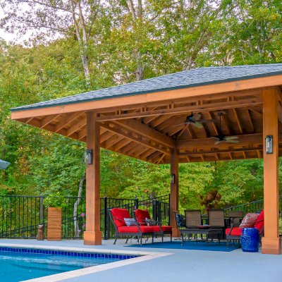 Custom Zen Garden Pavilion (Options: 26ft x 22ft, No Deck & Railings, Mature Redwood, 11' H Posts, with Square 10 x 10 Posts Instead of Rounded, 4 Electrical Wiring Trims, 4 Post High-Wind Anchor Kit, 2 Ceiling Fan Bases, No Curtain Rods, Transparent Premium Sealant). Photo Courtesy of P. Gmerek of Wildwood, Missouri.