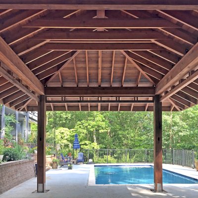Custom Zen Garden Pavilion (Options: 26ft x 22ft, No Deck & Railings, Mature Redwood, 11' H Posts, with Square 10 x 10 Posts Instead of Rounded, 4 Electrical Wiring Trims, 4 Post High-Wind Anchor Kit, 2 Ceiling Fan Bases, No Curtain Rods, Transparent Premium Sealant). Photo Courtesy of P. Gmerek of Wildwood, Missouri.