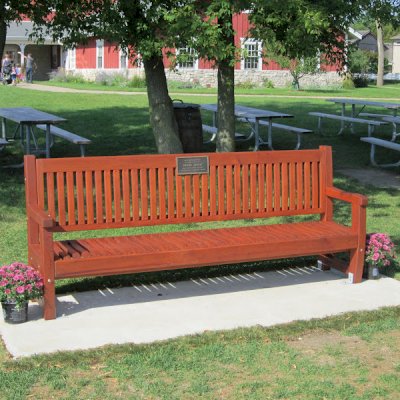 Ti Amo Benches (Options: 8 ft, Old-Growth Redwood, No Cushion, No Engraving, Custom Plaque Provided by Customer, Transparent Premium Sealant). Photo Courtesy of Todd Price of the Wagner Farm.