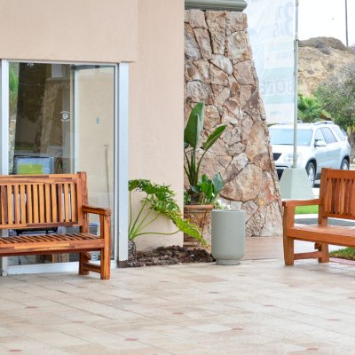 Ti Amo Benches (Options: 5 ft, Right- California Redwood and Left-Mosaic Redwood, No Cushion, No Engraving, Transparent Premium Sealant). Photo Courtesy of The Estero Beach Resort of Ensenada, Baja, Mexico.