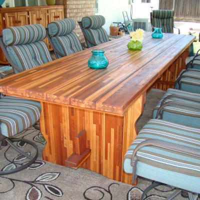 Trestle Natural Wood Outdoor Table (Options: 10' L, 28 3/4" W Tabletop, No Seating, Mosaic Redwood, Standard Tabletop, Squared Corners, No Umbrella Hole, Transparent Premium Sealant). Photo Shows Kiyomi's Host Cart in Background. Photo Courtesy of Robbi & Mike of Concorde, CA.