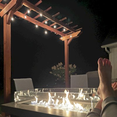 Custom 3-Post Wood Arbor (Options: 22' x 4', California Redwood, 10 ft H, 3 High-Wind Anchor Kit, 6x6 Posts, 2x8 Supports, 2x6 Rafters, Electrical Trim Kit for 1 Post, Transparent Premium Sealant). Photo Courtesy of N. Oppedahl of Frontenac, MN.